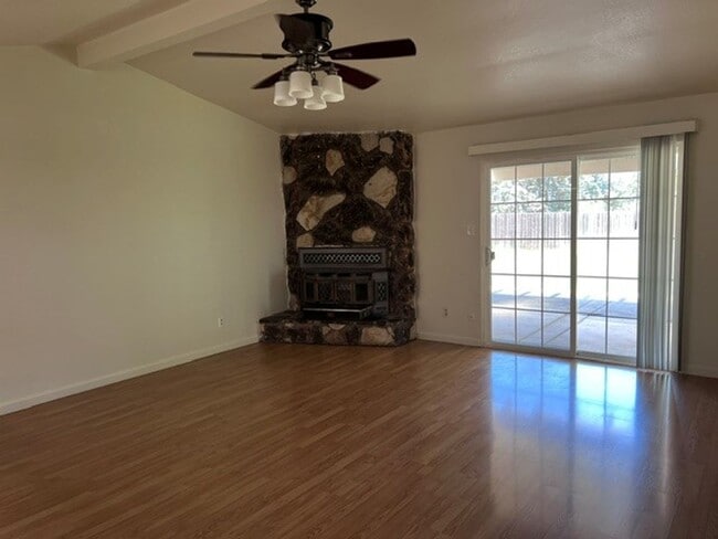 Building Photo - Freshly painted 4 bedroom home on over 2 acres of land.