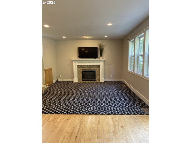 Building Photo - 9587 NW Caxton Ln