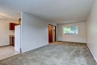 Building Photo - Cozy, Yet Spacious Upper Studio Apartment!!