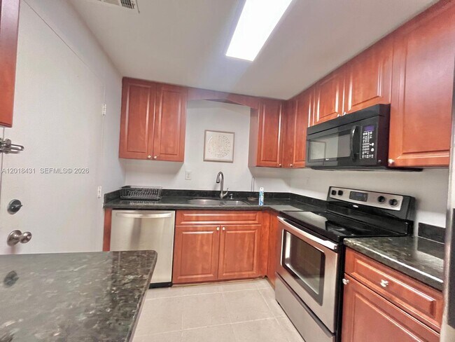 Building Photo - 5838 Collins Ave