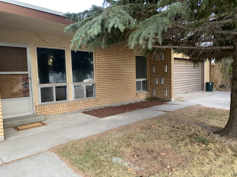 Front of apartment #1/shared garage - 896 Raymond Dr