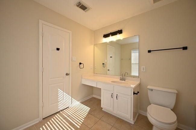 Building Photo - 9403 Coatsworth Dr