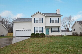 Building Photo - Pet Friendly Three Bedroom with Bonus!