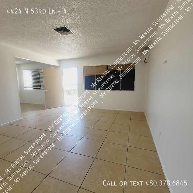 Building Photo - 4424 N 53rd Ln