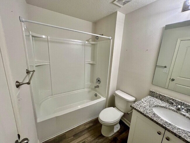 Building Photo - Spacious 4-Bedroom Home with Primary Suite...