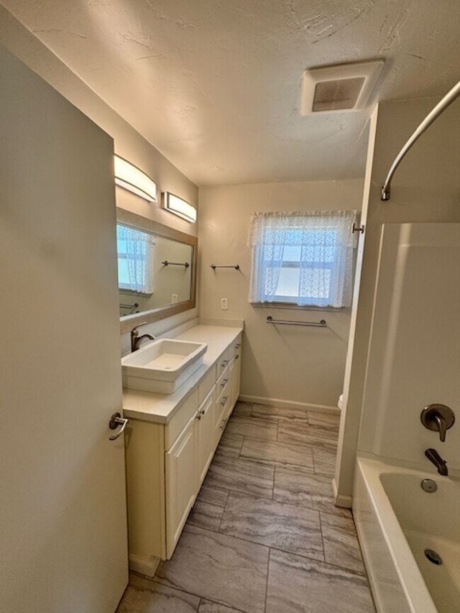 Building Photo - Charming Updated 4-Bedroom Home in the Garden Tract – Hardwood Floors, Central Air, 2-Car Garage ...