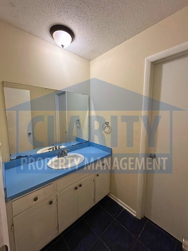 Building Photo - Three bedroom home w/ two bonus rooms!