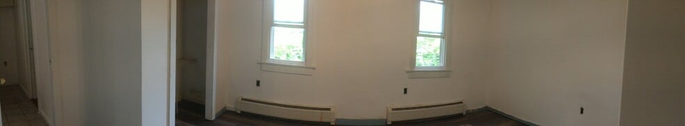 You will enjoy the radiant heat in this space during the winter - 122 Dewey avenue