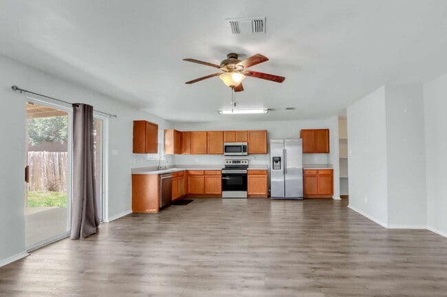 Building Photo - "Spacious 4-Bed, 3-Bath Retreat with Solar Panels!"