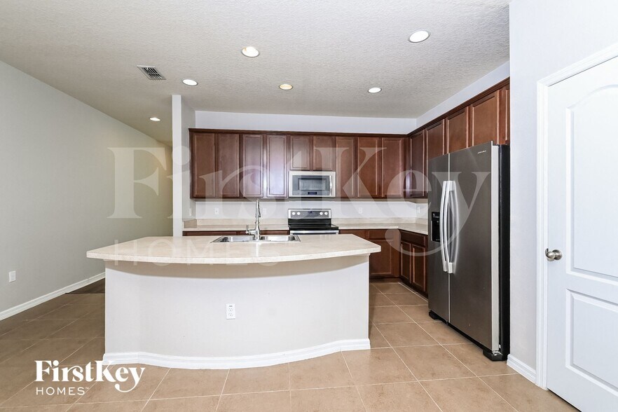 Building Photo - 7724 Tangle Rush Dr