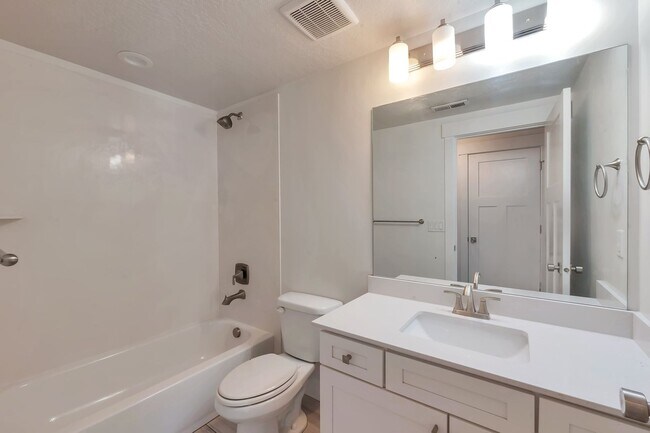 Building Photo - Modern Row End Townhome w 2 car attached g...