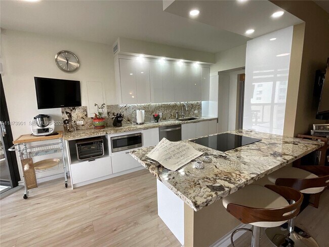 Building Photo - 20191 E Country Club Dr