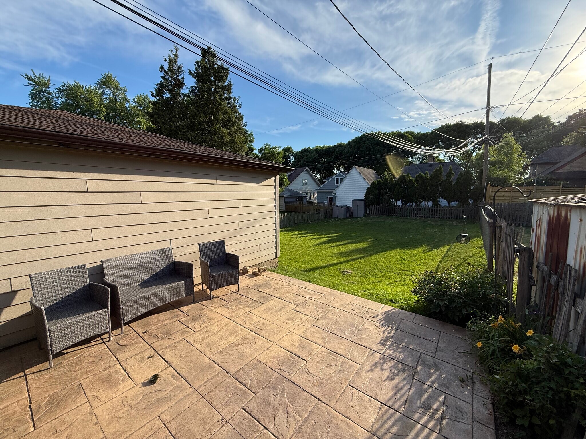 Stamped patio w/ large yard - 2543 N 65th St