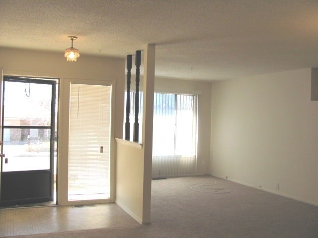 Building Photo - NE ENCHANTED MESA 3/BD 2/BA 2/CG