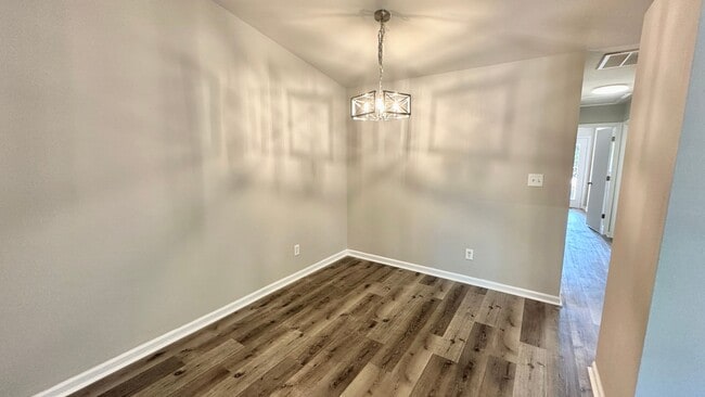 Building Photo - RENOVATED 2/2 w/ Updated Flooring, Paint, Appliances, & Fixtures! Open Floor Plan & Fenced Yard! ...