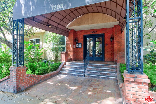 Building Photo - 1203 N Sweetzer Ave