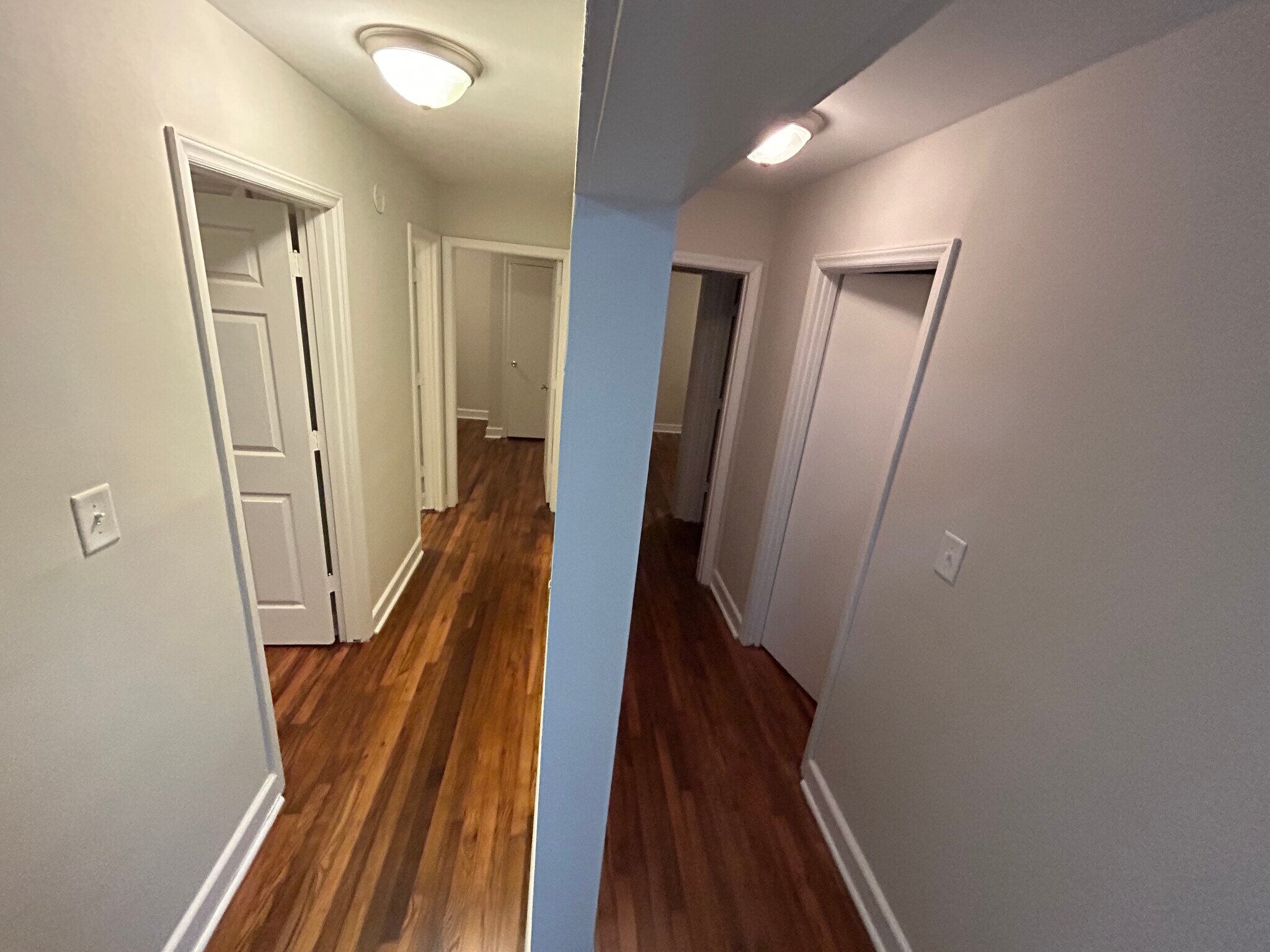 Both hall ways leading to two bedrooms and one bath on each side - 305 Orange St