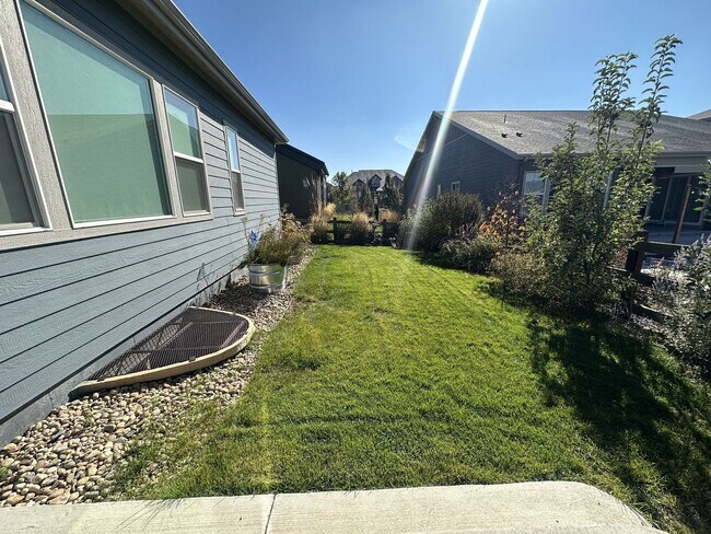 Building Photo - Modern 4-Bed Ranch in Erie with 13-Ft Ceilings, Solar Panels & EV Charger