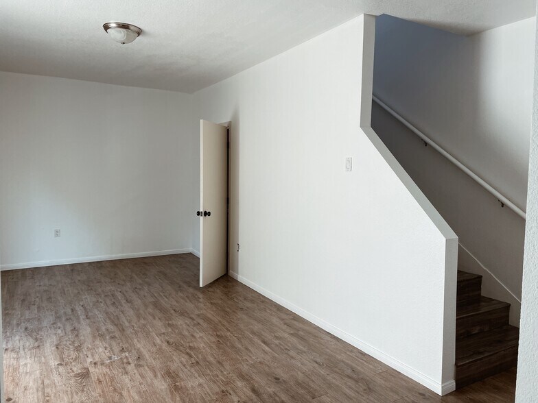 Living room/ downstairs powder bath - 3959 S Van Ness Ave