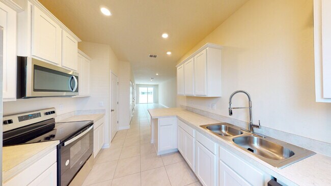 Building Photo - "Charming 3-Bedroom Townhouse Retreat on Oak Mill Road – Spacious 1308 Sq Ft with 2 Full Baths in...