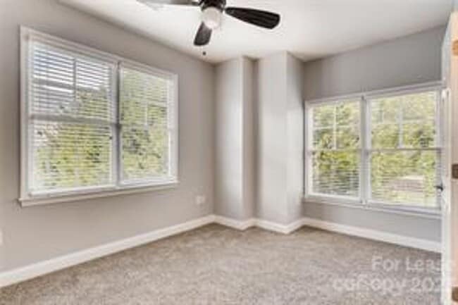 Building Photo - Wonderful craftsman style end-unit townhome