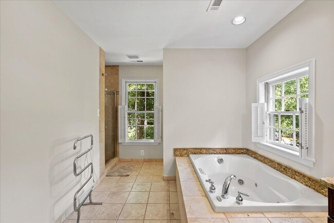 Building Photo - "Luxurious 3-Bed Retreat with Finished Bas...