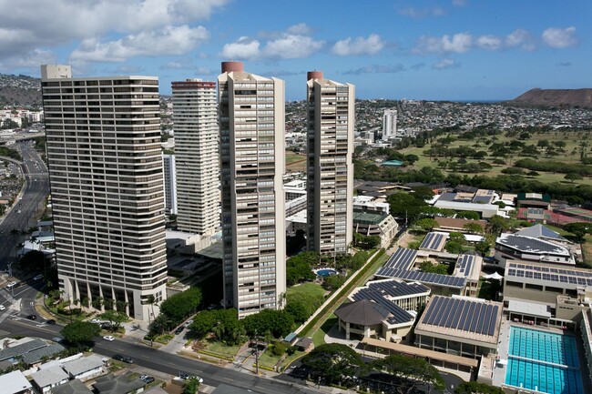 Building Photo - Royal Iolani Corner Unit - 2 PRK w/ ALL Ut...