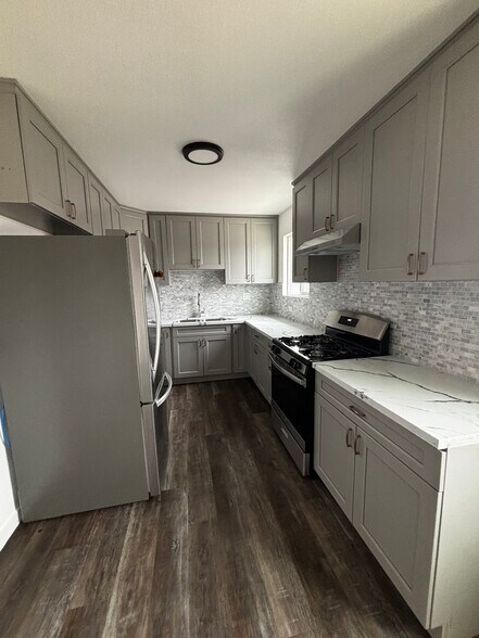 Building Photo - 1674 W 36th Pl