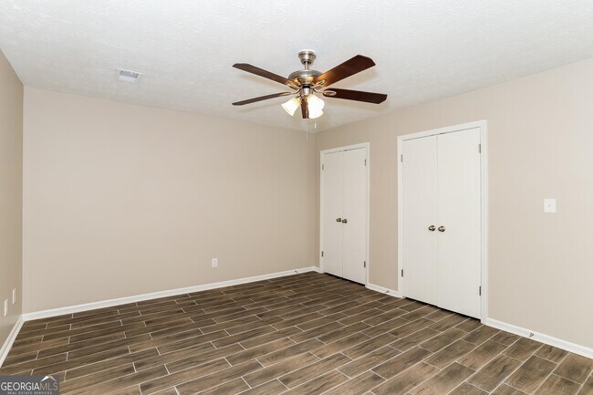 Building Photo - 9073 Woodgreen Way