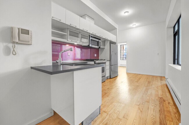 Building Photo - Welcoming  1-Bedroom with Home Office and Private Terrace.