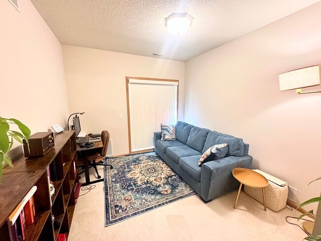 Building Photo - Modern 2-Bedroom Condo with Balcony & Heat...