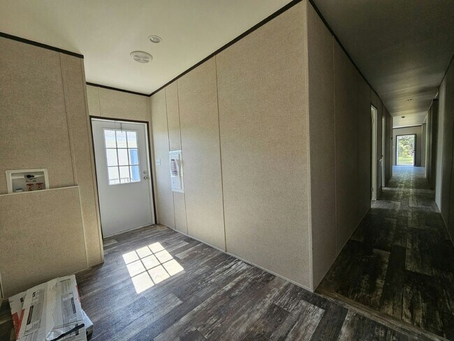 Building Photo - 6591 Hidden Oaks Dr