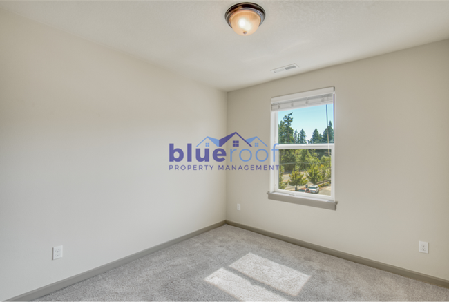 Building Photo - 7761 NE Mary Beth Ln