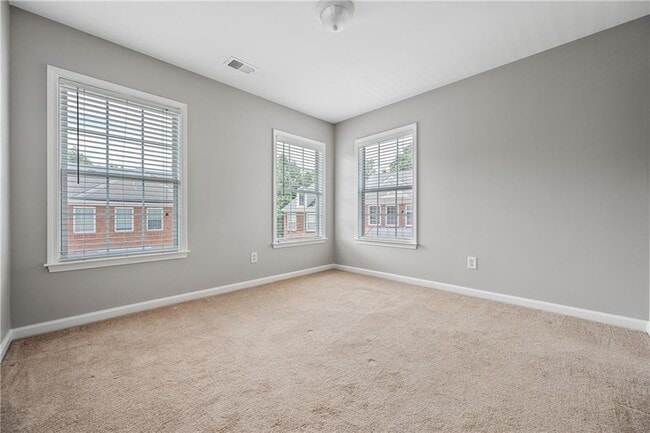 Building Photo - 4721 Creekside Villas Way