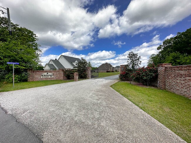 Building Photo - Furnished and utilities included!  1 bedroom garage apartment in *Stonewall* gated neighborhood!