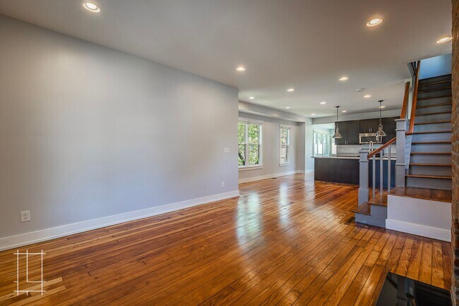 Building Photo - Available Now: One Month Free Rent!