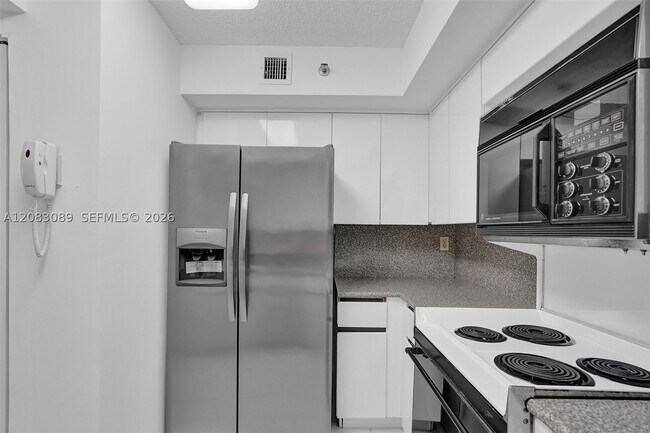 Building Photo - 6767 Collins Ave