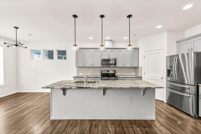 Building Photo - Spacious 4-Bedroom Home with Quartz Counters, Fully Fenced Yard & 2-Car Garage in Yelm!