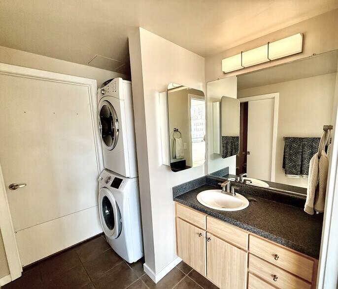 Bathroom vanity and laundry - 1475 Delgany St