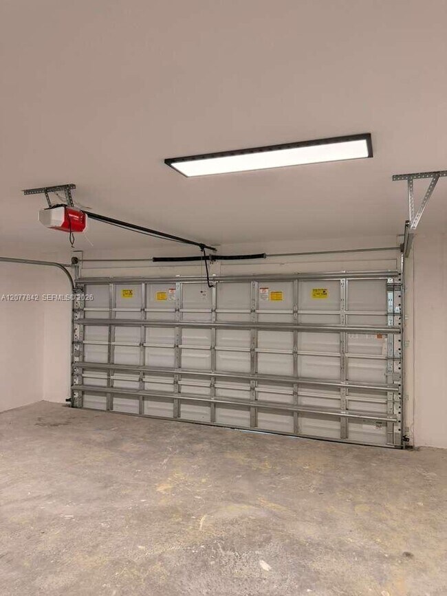 Building Photo - 8636 100th Ct