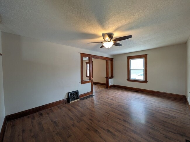 Building Photo - Large 4 Bedroom Home with Garage, Deck, & Fence!