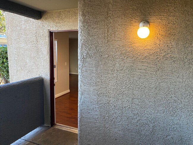 Building Photo - SW!! First floor unit with Balcony!! Gated!! Clubhouse!!  Community pool!! Spa!! Exercise Room!! ...