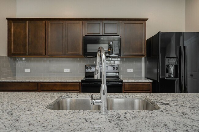 Building Photo - Live, love, and grow in this charming townhome!