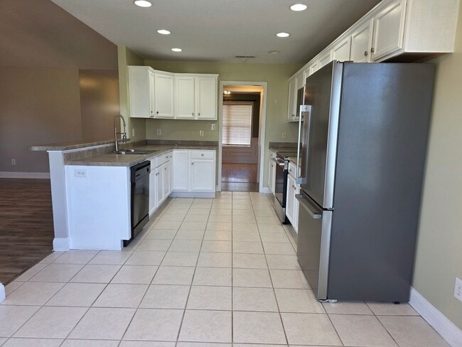 Building Photo - Spacious 4-Bedroom Bryan Farms Beauty with Bonus Suite, Large Fenced Yard & RV/Boat Parking!