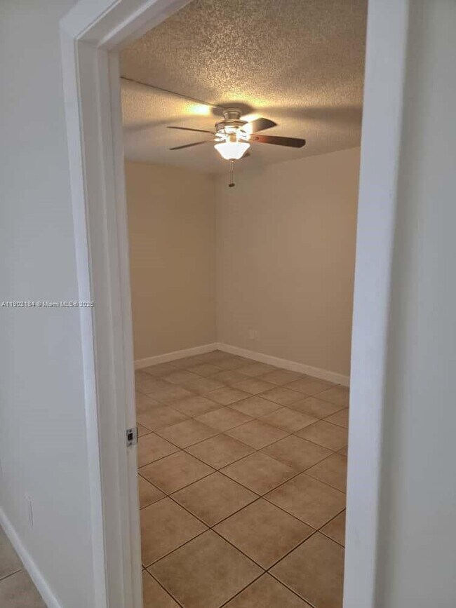 Building Photo - 7406 Woodmont Terrace