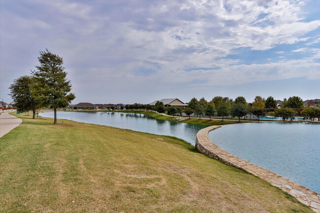 Fishing lakes with pools in background - 253 Gill Point Ln