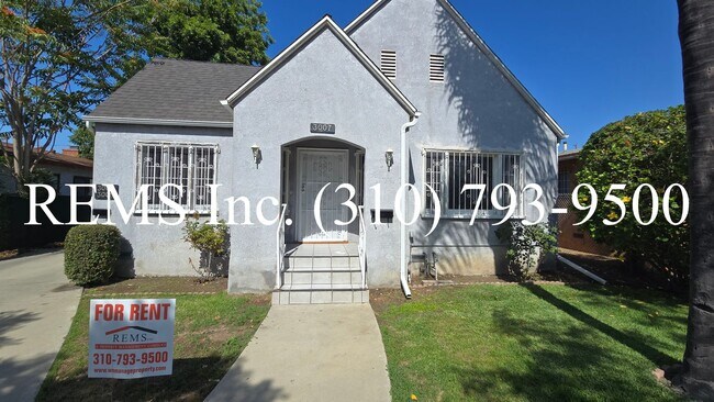 Primary Photo - Front House with Laundry and Parking