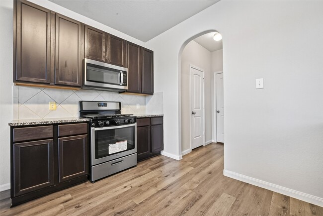 Building Photo - 4818 Blue Jacaranda Wy