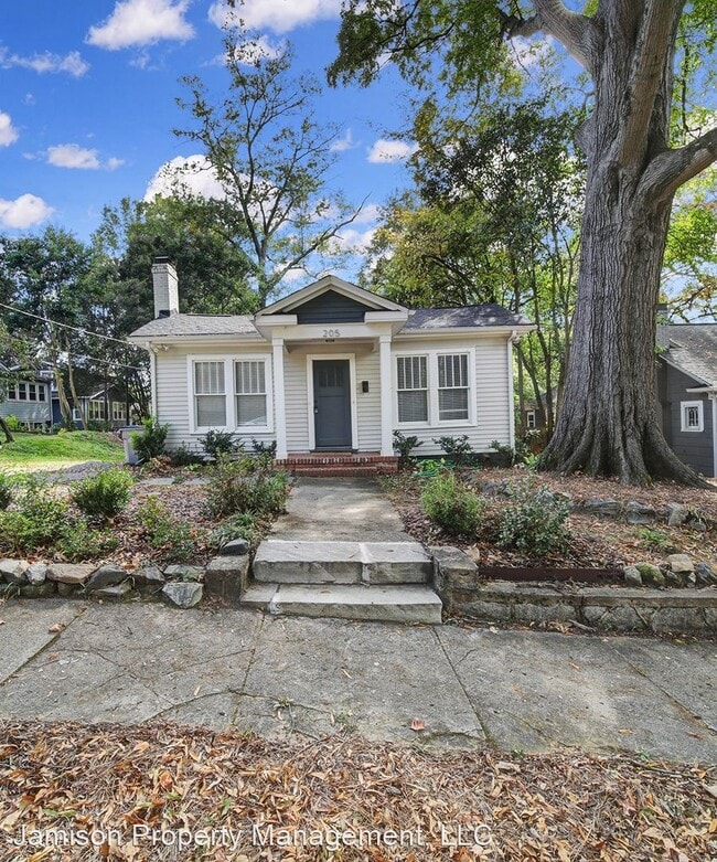 Building Photo - 2 br, 1 bath House - 205 W 6th St