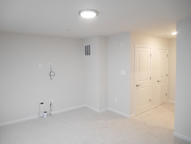 Building Photo - NEW BUILD! Four Bedroom Townhome- Prime Lo...